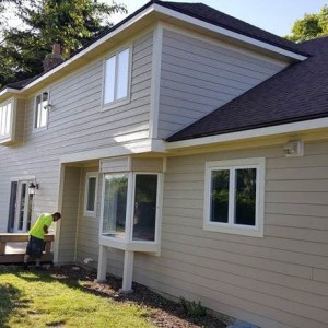 siding contractors Naperville IL constractor during work